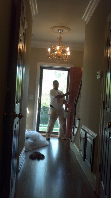 Freshly painted hallway and foyer in luxurious Charlotte home.